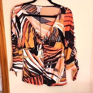 CACHE multil colored V top  with open sleeves that tie. Size Medium